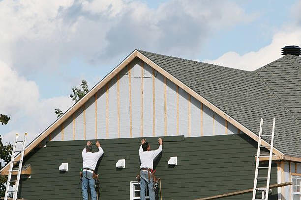 Professional Storm Damage Siding Repair technician working in Maugansville, MD